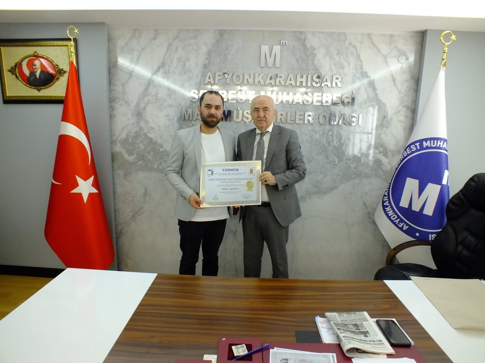 Afyonkarahisar Mali Müşavirler Odası’ndan Önder Karaman’a Ruhsat Takdimi
